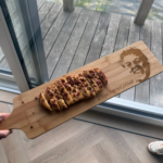 Productbeeld van PlankenKoning met gegraveerde borrelplanken